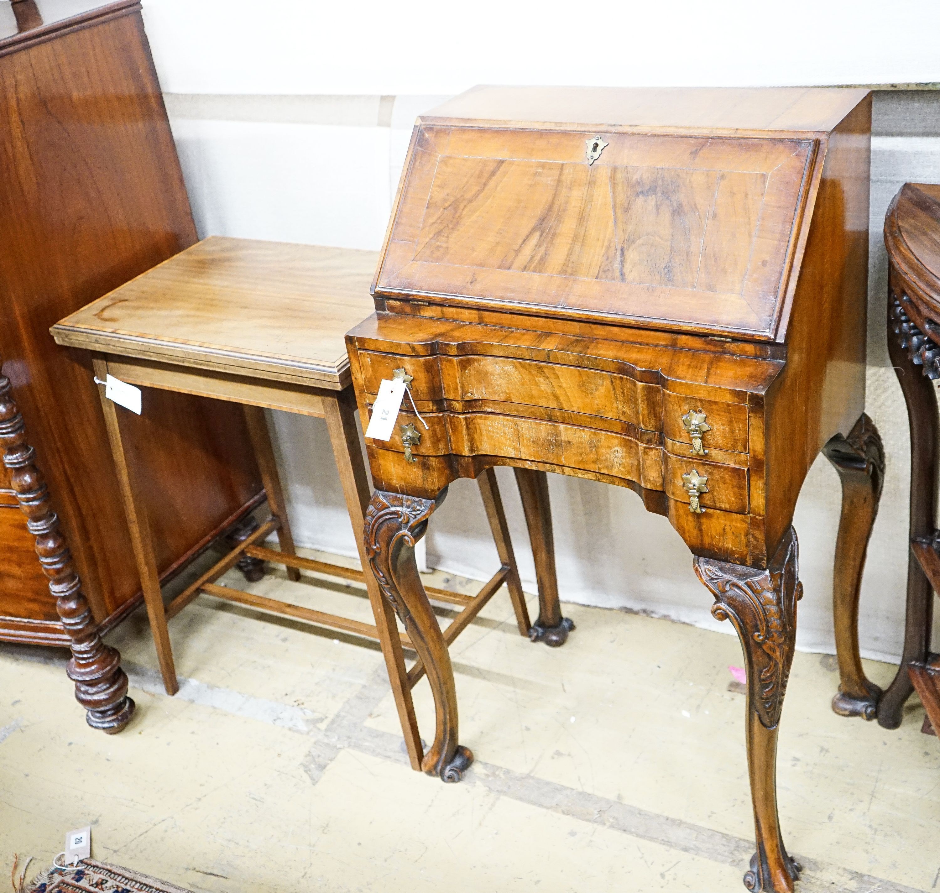 A small Queen Anne revival walnut bureau, width 52cm, depth 37cm, height 91cm together with an Edwardian satinwood banded folding mahogany card table